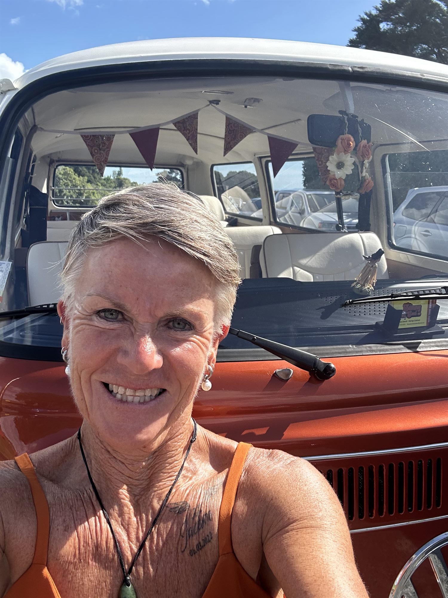 Linda taking a selfie with Solana the 1969 Kombi van on Waiheke Island