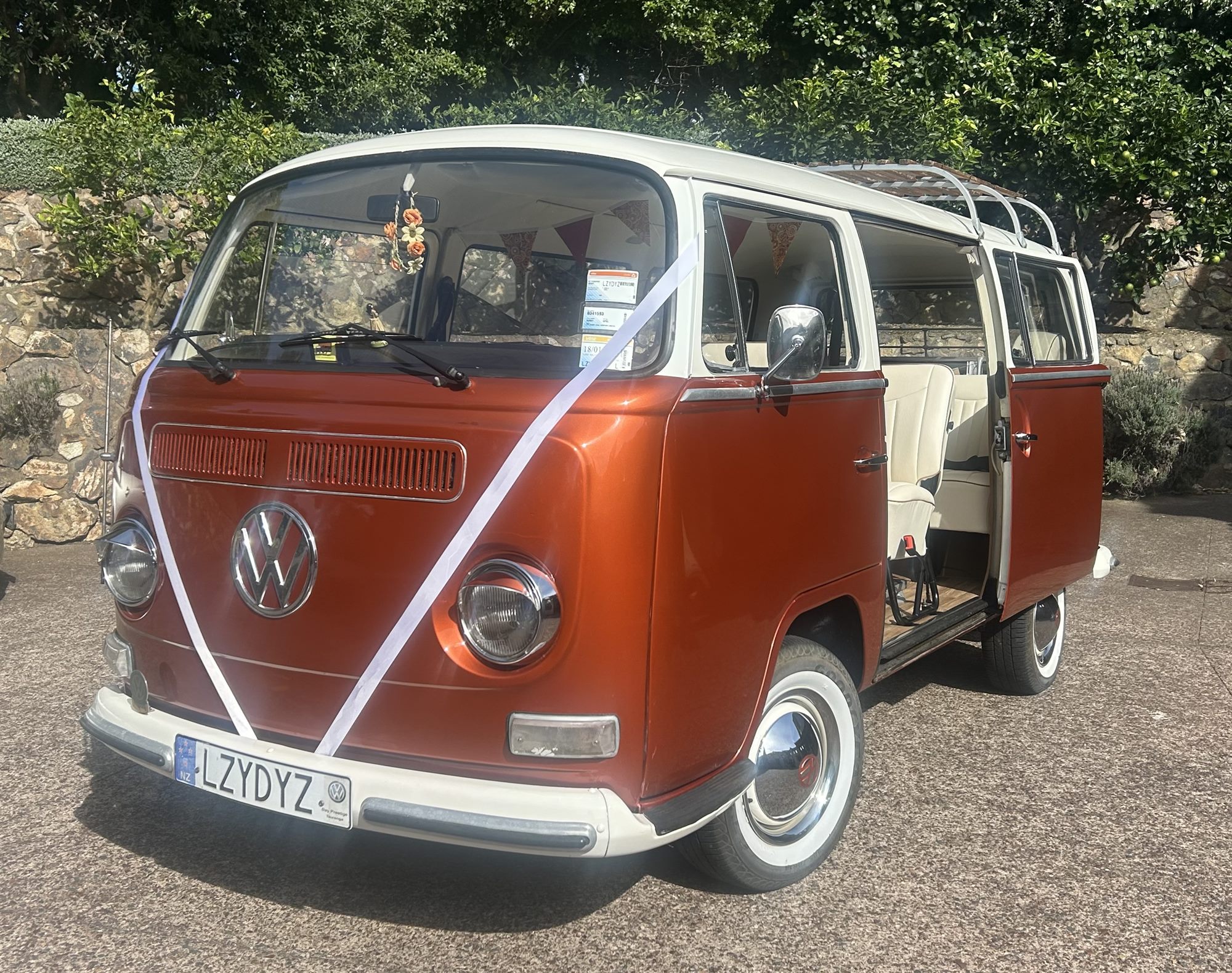Solana the 1969 Kombi van decorated with bridal ribbon for a Waiheke Island wedding