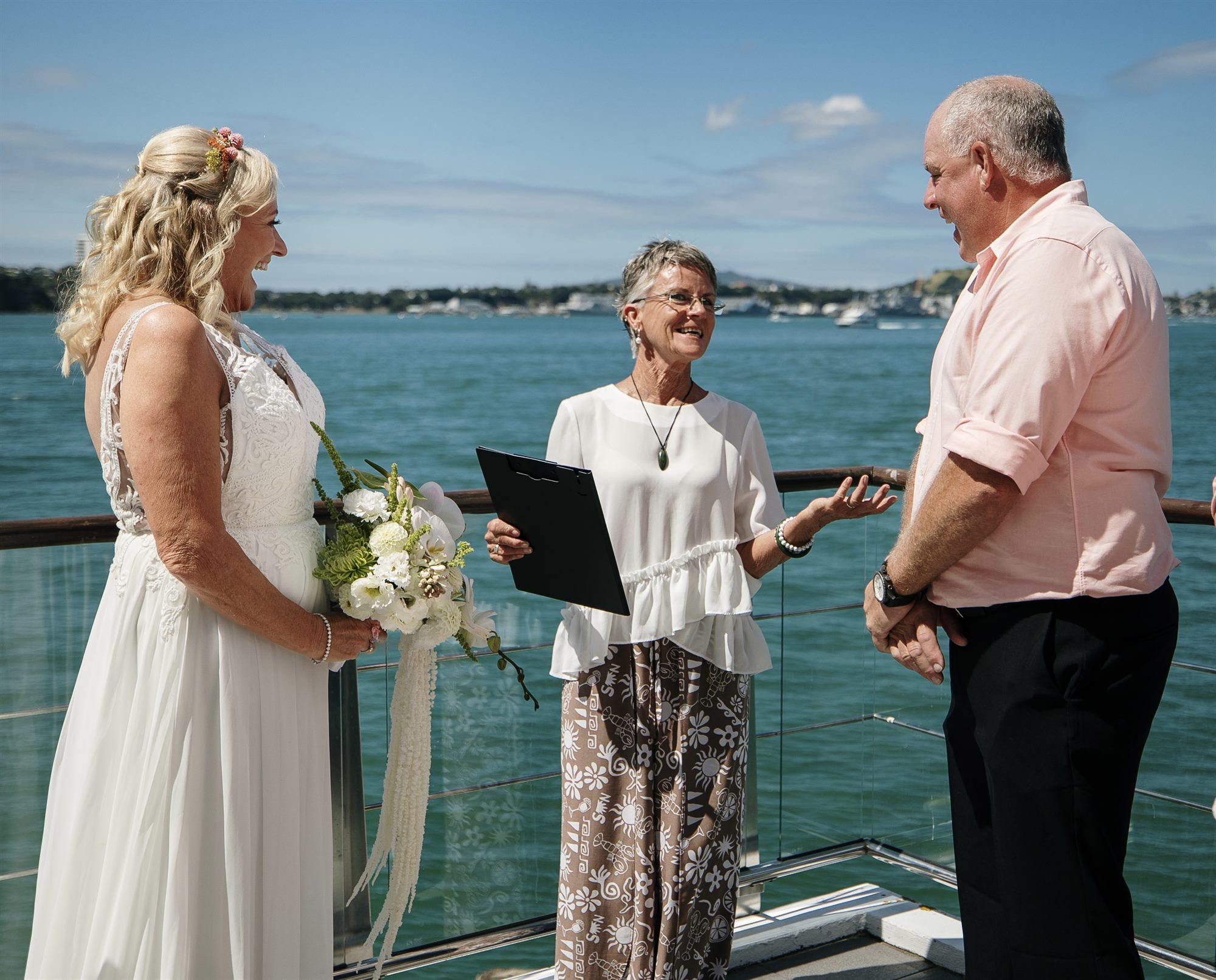Linda Deverell officiating a wedding ceremony on Waiheke Island